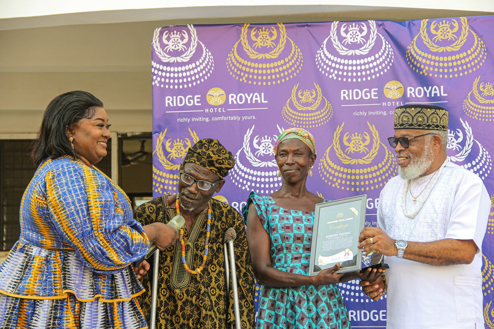 Kobina Odoku receives his certificate of honour